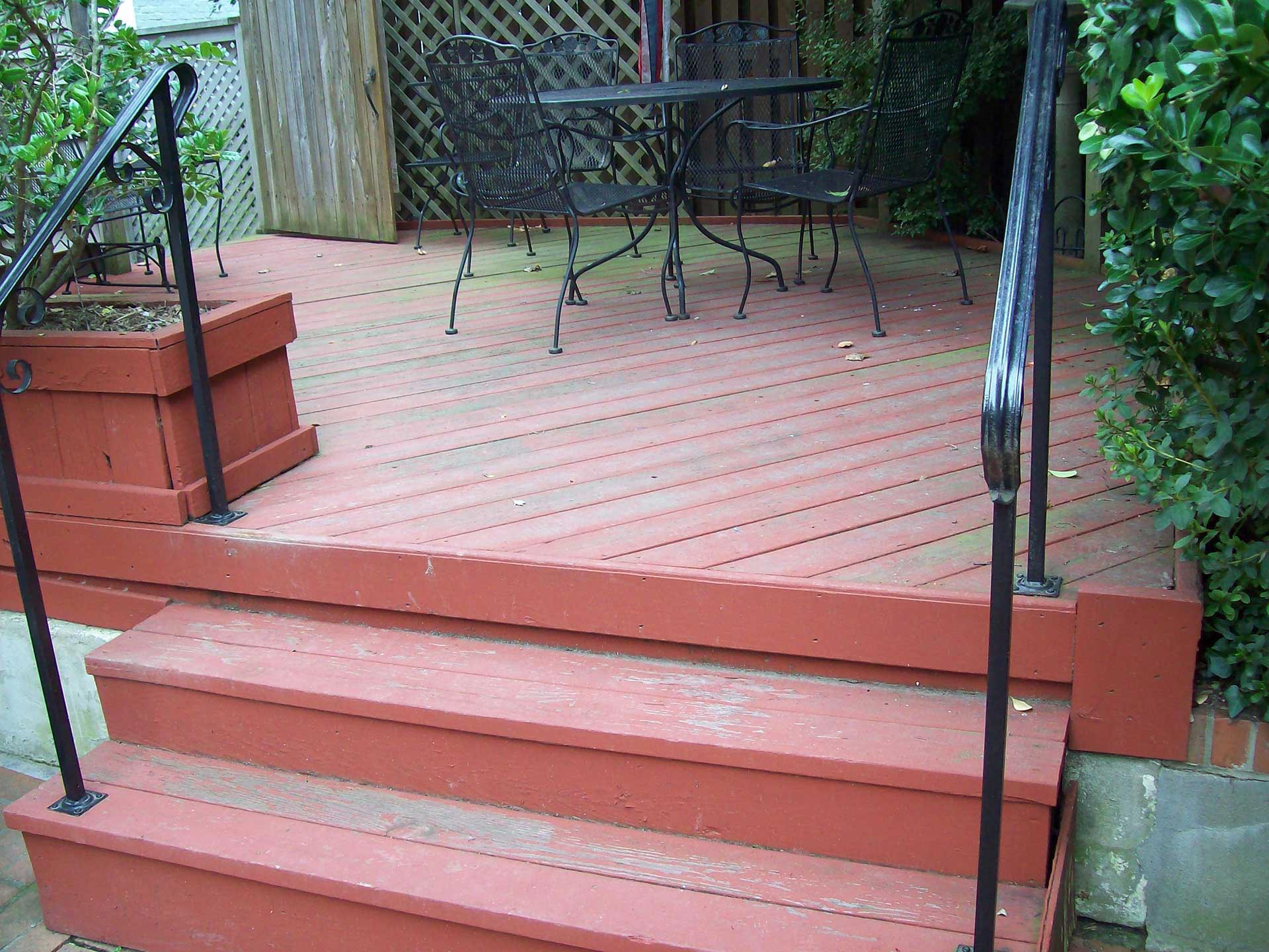 An exterior patio before residential painting services repair